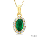 5x3 MM Oval Shape Emerald and 1/20 Ctw Round Cut Diamond Halo Precious Pendant with Chain in 14K Yellow Gold