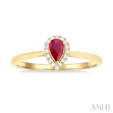 5x3 MM Pear Shape Ruby and 1/20 Ctw Round Cut Diamond Halo Precious Ring in 10K Yellow Gold