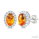 5x3 MM Oval Shape Citrine and 1/8 Ctw Round Cut Diamond Halo Semi-Precious Stud Earrings in 14K White Gold