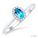 5x3 MM Oval Shape Blue Topaz and 1/20 Ctw Round Cut Diamond Halo Semi-Precious Ring in 10K White Gold