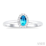 5x3 MM Oval Shape Blue Topaz and 1/20 Ctw Round Cut Diamond Halo Semi-Precious Ring in 10K White Gold