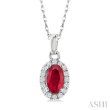5x3 MM Oval Shape Ruby and 1/20 Ctw Single Cut Diamond Halo Precious Pendant with Chain in 10K White Gold