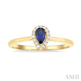 5x3 MM Pear Shape Sapphire and 1/20 Ctw Round Cut Diamond Halo Precious Ring in 10K Yellow Gold
