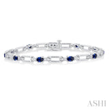 4X3 MM Oval Cut Sapphire and 1/10 Ctw Round Cut Diamond Paperclip Bracelet in 14K White Gold