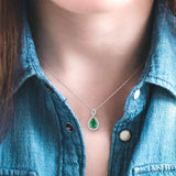 6x4 MM Pear Shape Emerald and 1/10 Ctw Round Cut Diamond Pendant in 14K White Gold with Chain