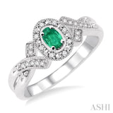 5x3 MM Oval Cut Emerald and 1/50 ctw Single Cut Diamond Ring in Sterling Silver