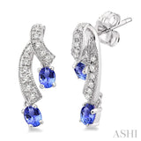 4x3MM Oval Cut Tanzanite and 1/5 Ctw Round Cut Diamond Precious Earrings in 14K White Gold