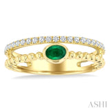 4x3 MM Oval Shape Emerald and 1/5 Ctw Round Cut DiamondsPrecious Fashion Split Twin Ring in 10K Yellow Gold
