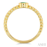 4x3 MM Oval Shape Emerald and 1/5 ctw Single Cut Diamonds Precious Fashion Split Twin Ring in 10K Yellow Gold