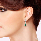 5x3 MM Pear Shape Emerald and 1/3 ctw Round Cut Diamond Earrings in 14K Yellow Gold