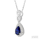 6x4 MM Pear Shape Sapphire and 1/10 Ctw Round Cut Diamond Pendant in 14K White Gold with Chain