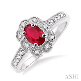 6x4mm Oval Cut Ruby and 1/6 Ctw Single Cut Diamond Ring in 14K White Gold