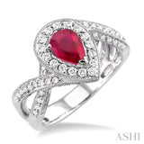 7x5mm Pear Shape Ruby and 3/4 Ctw Round Cut Diamond Ring in 14K White Gold
