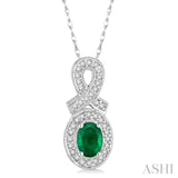 6x4 MM Oval Cut Emerald and 1/5 Ctw Round Cut Diamond Pendant in 10K White Gold with Chain