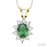 7x5MM Oval Cut Emerald and 1/3 Ctw Round Cut Diamond Pendant in 14K Yellow Gold with Chain