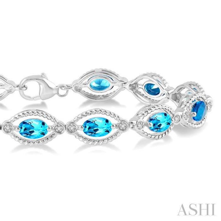 Oval Sky Blue Topaz and Diamond Accent Tennis Bracelet in Sterling Silver -  7.5