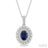 3/4 Ctw Oval Shape 7x5MM Sapphire and Round Cut Diamond Precious Pendant With Chain in 14K White Gold